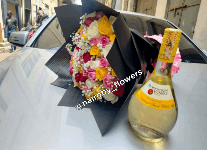 SWEET WHITE ROBERTSON & 60 ROSES BOUQUET