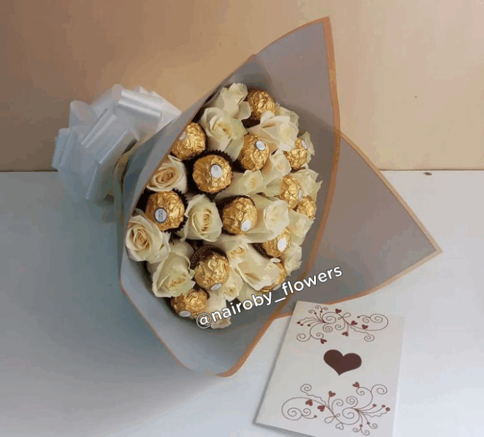 FERRERO CHOCOLATES WITH WHITE ROSES.