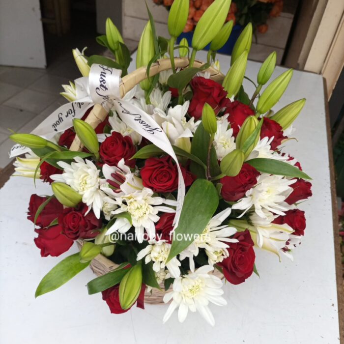 A HEROIC WOMAN BASKET ARRANGEMENT