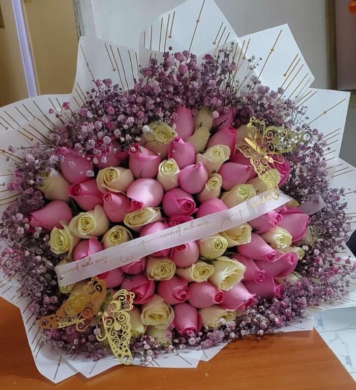 COLORED BABY BREATH & ROSES