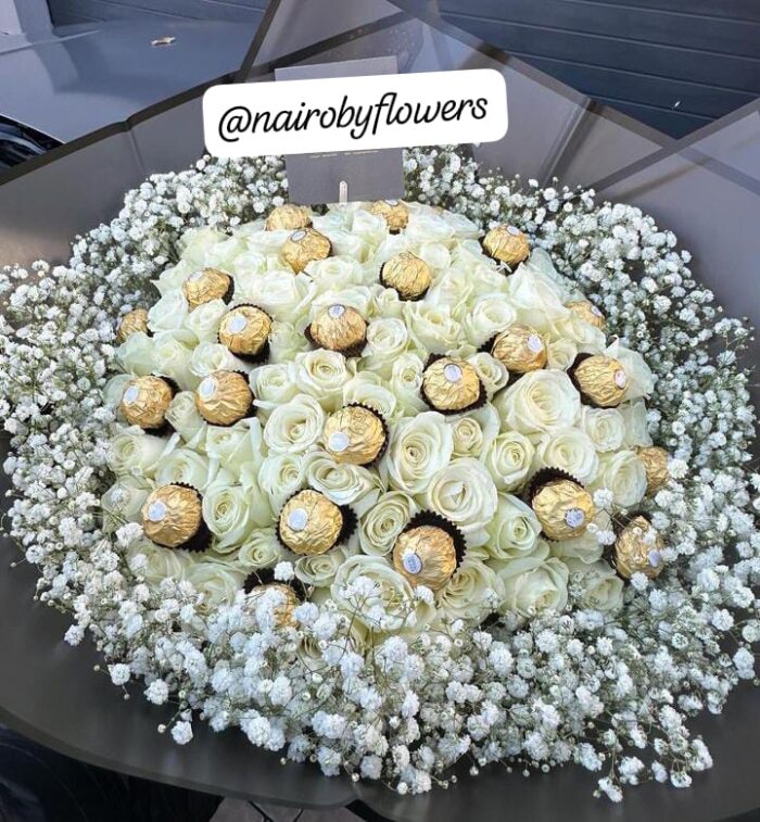 24 FERRERO CHOCOLATES & WHITE ROSES BOUQUET WITH BABY BREATH RIM