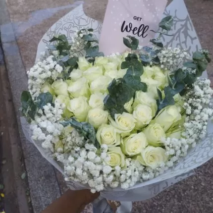 60 WHITE ROSES WITH BABY BREATH RIM & EUCALYPTUS FILLERS