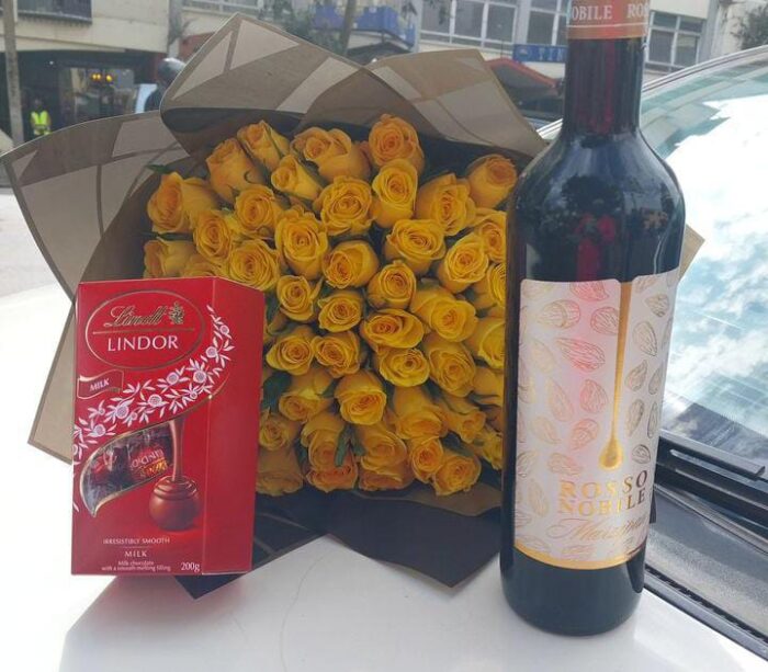 LINDT CHOCOLATE,ROSSO NOBILE WINE & YELLOW ROSES